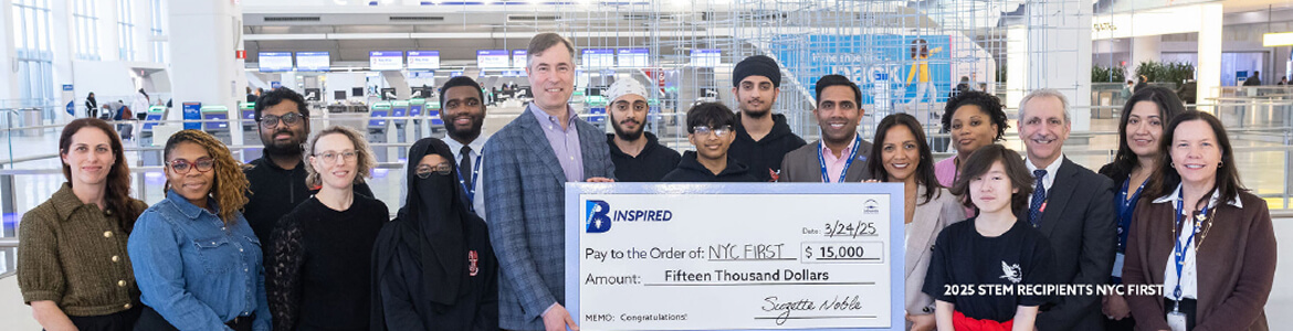 B-Inspired 2024 Winners and LGP team members posing with an oversized check for a photo